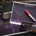 Stock report on black surface